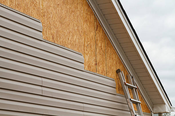Professional Emergency Siding Repair technician working in Georgetown, KY